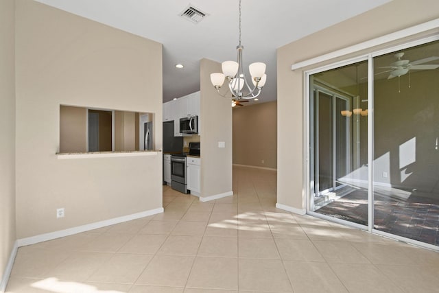 interior space with ceiling fan with notable chandelier and light tile patterned flooring