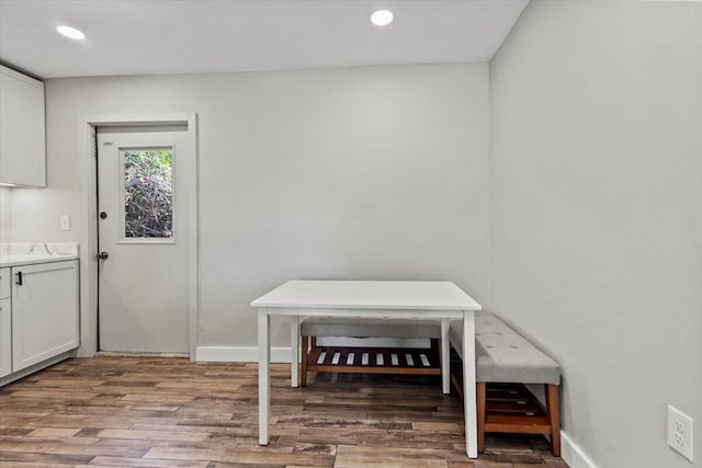 dining area with wood-type flooring