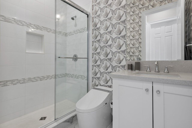 bathroom with vanity, toilet, and an enclosed shower