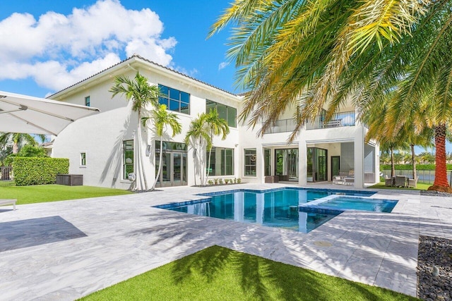 view of pool with cooling unit and a patio area