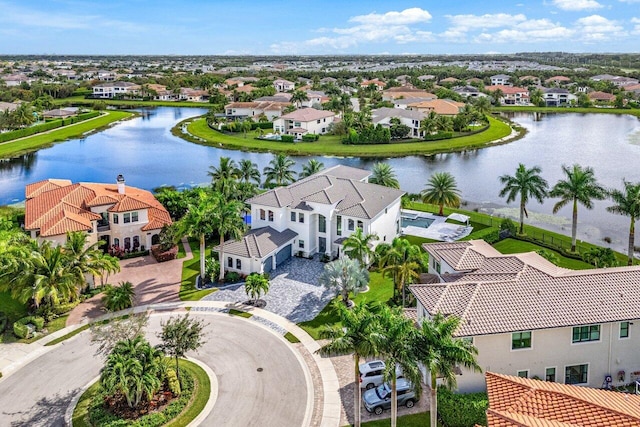 drone / aerial view featuring a water view