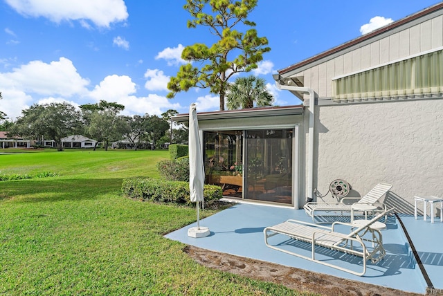 view of yard with a patio area