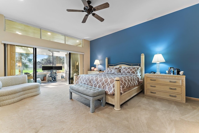 carpeted bedroom featuring access to exterior and ceiling fan