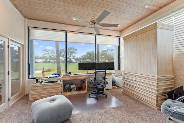 office space with carpet flooring, a wealth of natural light, and wooden ceiling