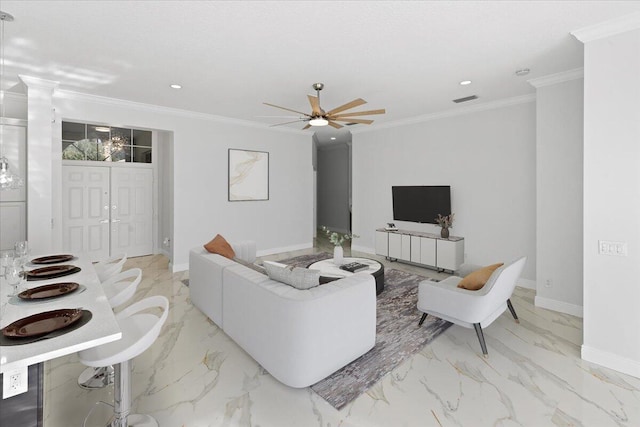 living room featuring ceiling fan and ornamental molding