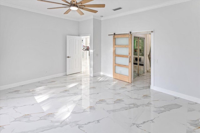 unfurnished room featuring a barn door, ceiling fan, and ornamental molding