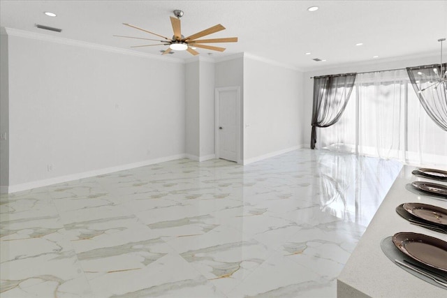 spare room with crown molding and ceiling fan