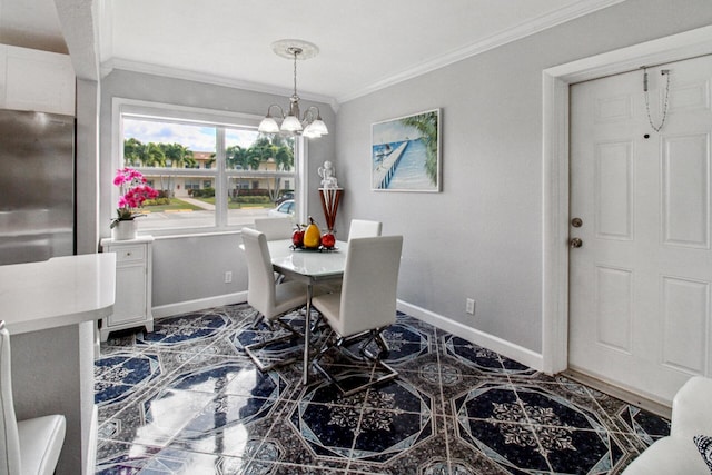 dining area featuring ornamental molding and a chandelier