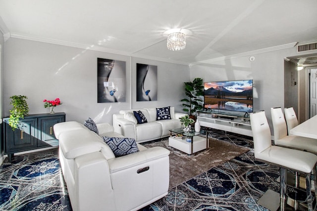 living room with crown molding and a notable chandelier