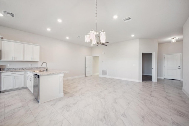 kitchen featuring stainless steel dishwasher, ceiling fan, sink, white cabinets, and hanging light fixtures