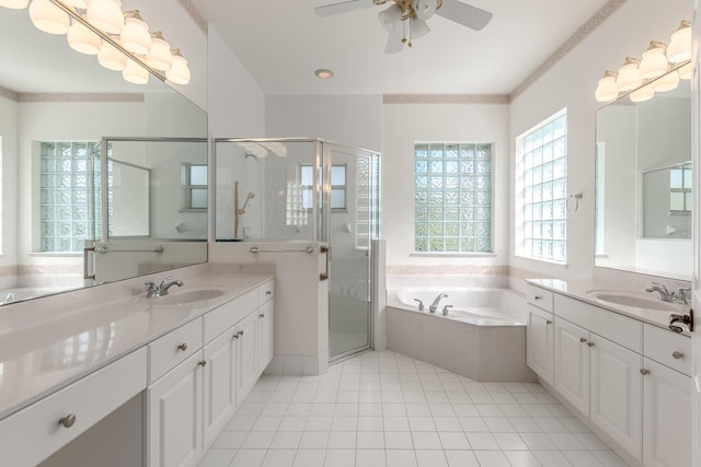 bathroom featuring tile patterned floors, ceiling fan, vanity, and independent shower and bath