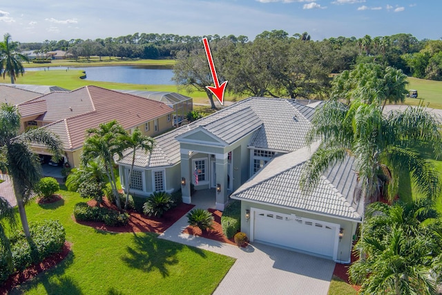 bird's eye view with a water view