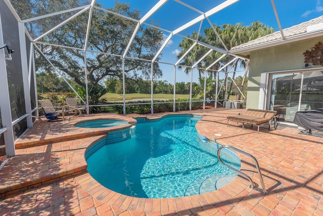 view of pool with glass enclosure, an in ground hot tub, and a patio