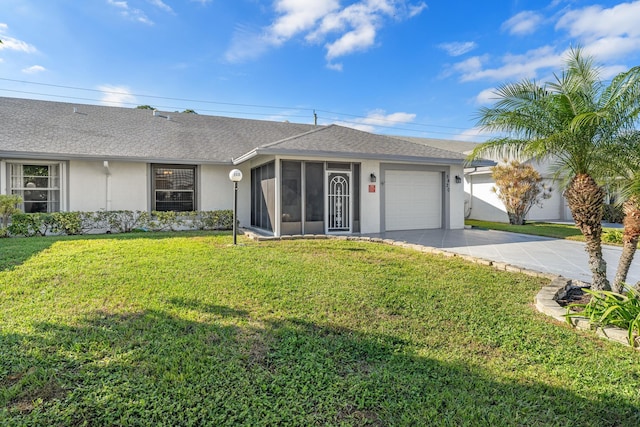 ranch-style house with a sunroom, a front lawn, and a garage