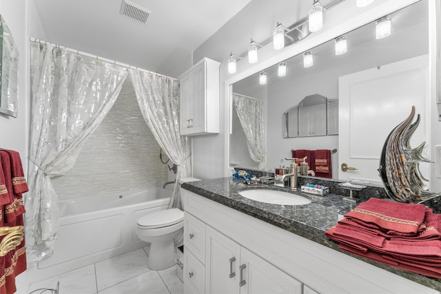 full bathroom featuring shower / tub combo, vanity, and toilet