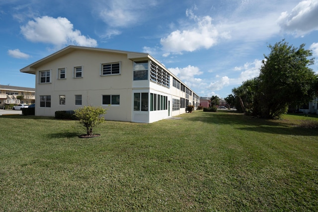 exterior space featuring a yard