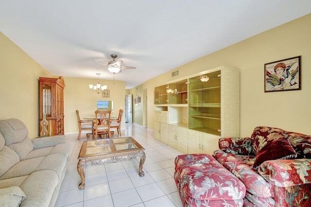 living room with ceiling fan and light tile patterned floors