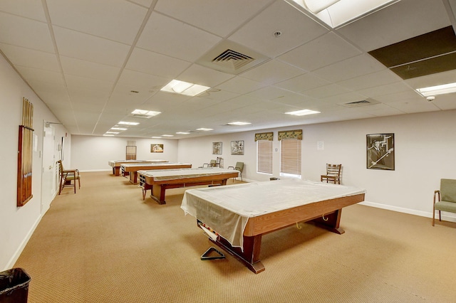 recreation room with a paneled ceiling, light carpet, and pool table