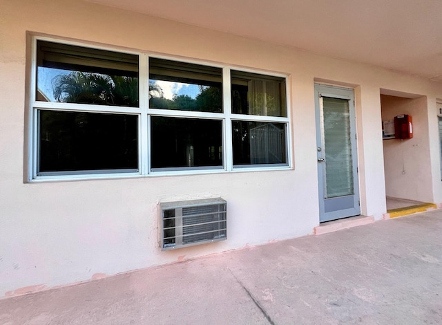 doorway to property featuring heating unit