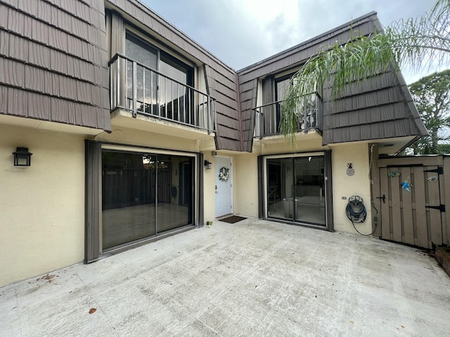 back of property with a patio area