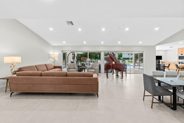 4246 Live Oak Blvd, Delray Beach, FL 33445 - living room featuring vaulted ceiling and recessed lighting