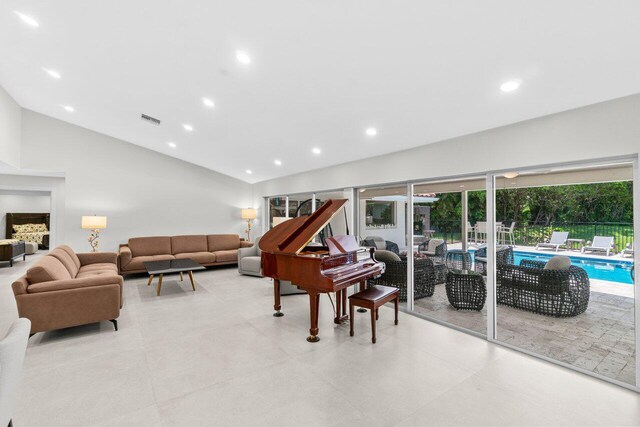 4246 Live Oak Blvd, Delray Beach, FL 33445 - living area with lofted ceiling and recessed lighting