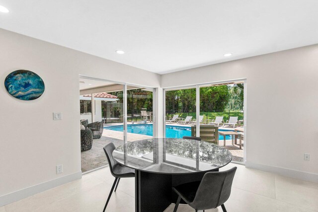 4246 Live Oak Blvd, Delray Beach, FL 33445 - dining room with recessed lighting, baseboards, and light tile patterned floors