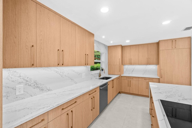4246 Live Oak Blvd, Delray Beach, FL 33445 - kitchen with stainless steel dishwasher, black electric stovetop, light stone countertops, a sink, and recessed lighting