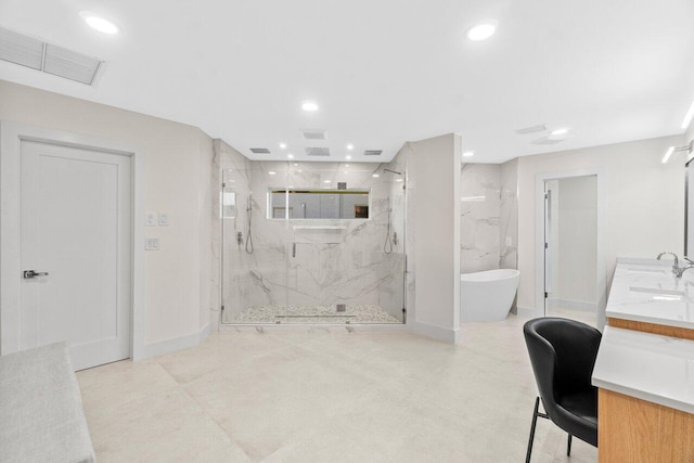 4246 Live Oak Blvd, Delray Beach, FL 33445 - full bath featuring a marble finish shower, a freestanding tub, recessed lighting, vanity, and baseboards