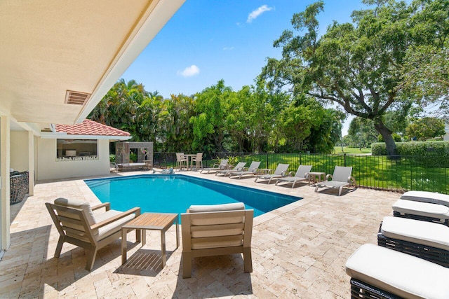 4246 Live Oak Blvd, Delray Beach, FL 33445 - view of pool with a patio area and view of scattered trees