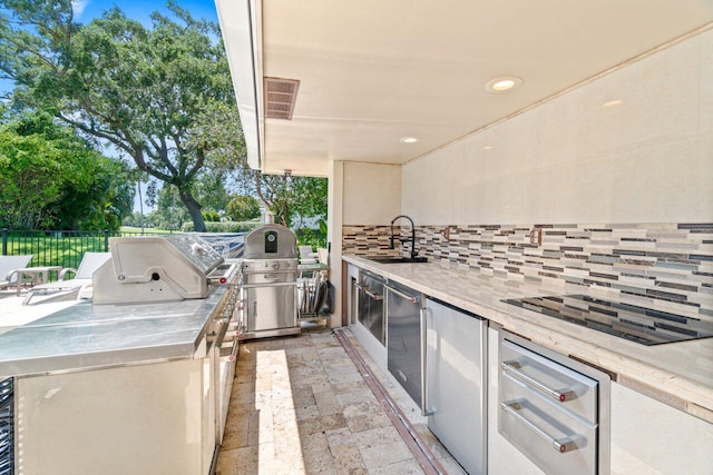 4246 Live Oak Blvd, Delray Beach, FL 33445 - view of patio with a sink