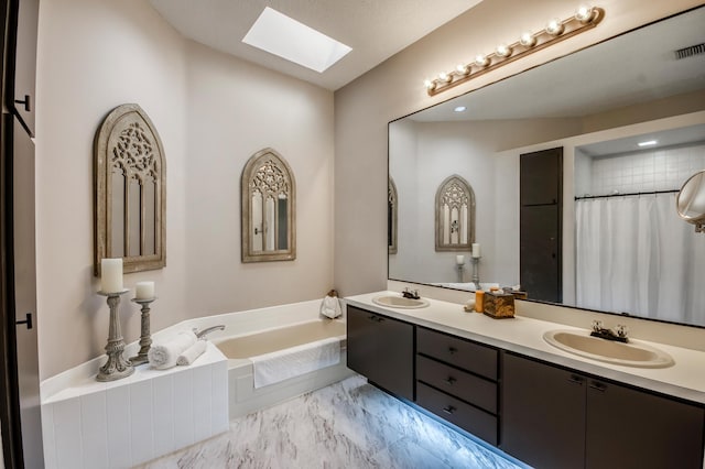 bathroom with vanity, plus walk in shower, and a skylight