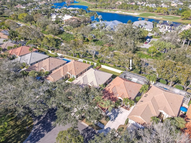 aerial view with a water view and a residential view