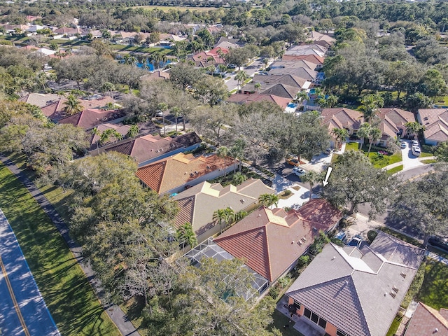 birds eye view of property with a residential view