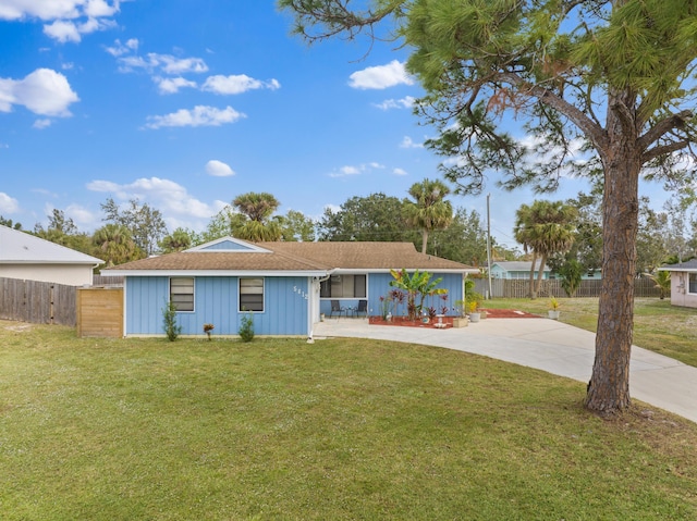 ranch-style house with a front yard