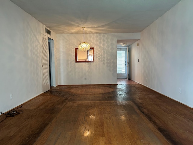 unfurnished room featuring hardwood / wood-style floors