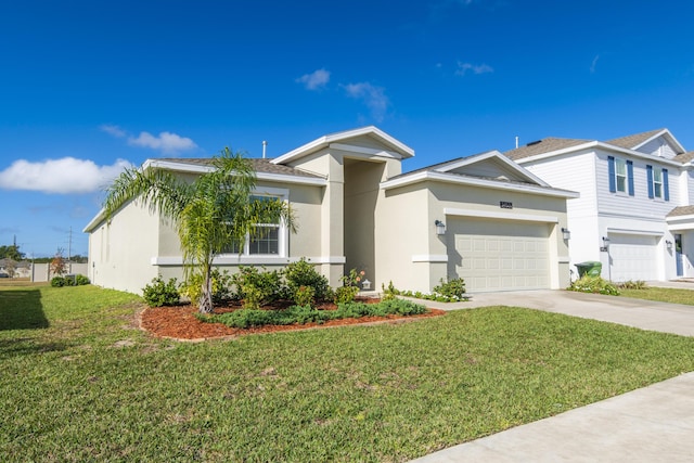 ranch-style house featuring a garage and a front lawn