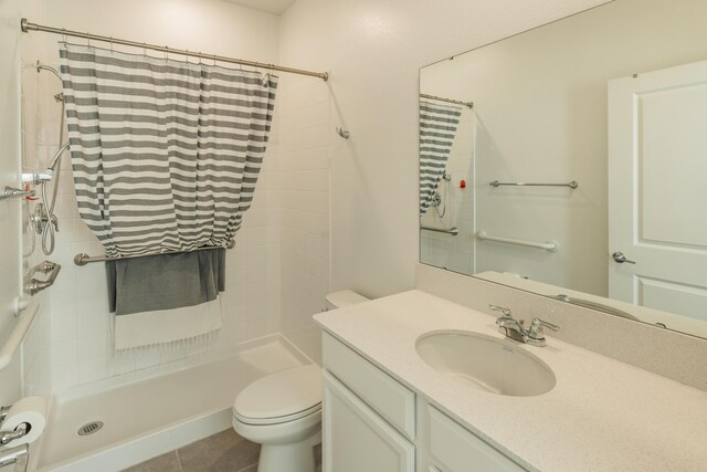 kitchen featuring sink, white cabinets, light tile patterned floors, and appliances with stainless steel finishes