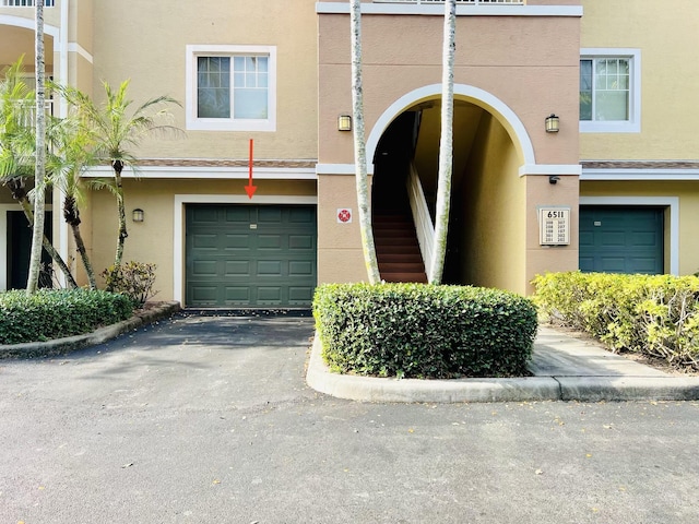 entrance to property featuring a garage