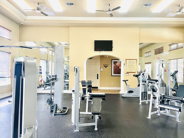 gym with ornamental molding