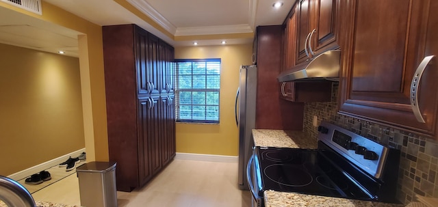 kitchen with backsplash, light stone countertops, crown molding, and appliances with stainless steel finishes