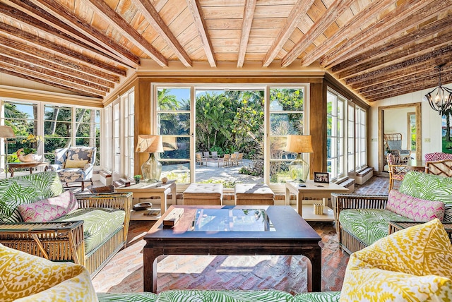 sunroom featuring lofted ceiling with beams, wood ceiling, and an inviting chandelier