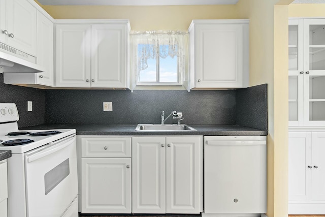 kitchen with exhaust hood, white appliances, white cabinetry, and sink