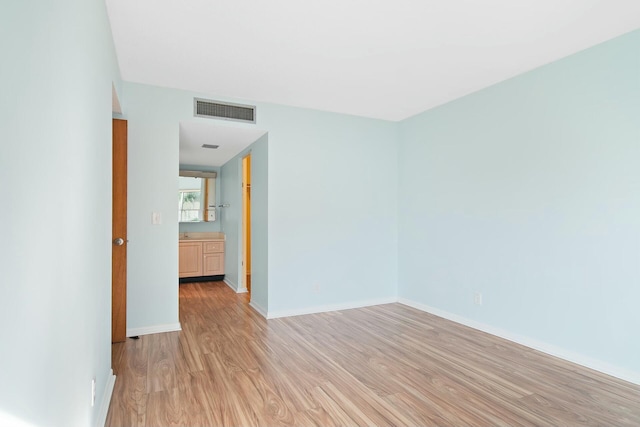 empty room featuring light wood-type flooring