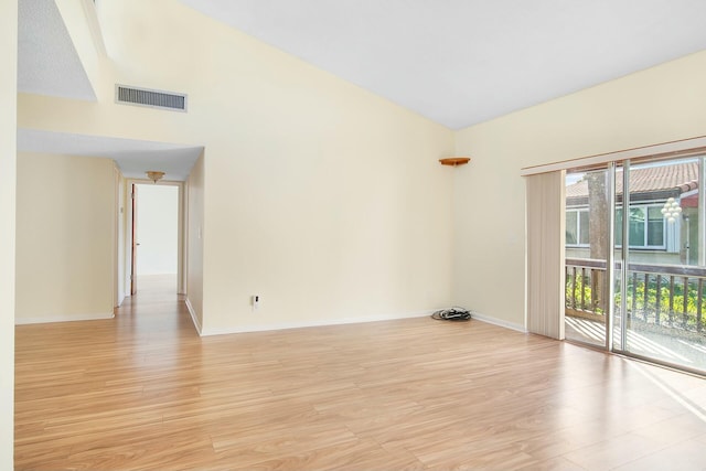 unfurnished room with light wood-type flooring