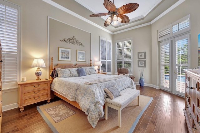 bedroom with baseboards, a ceiling fan, dark wood-type flooring, access to outside, and crown molding