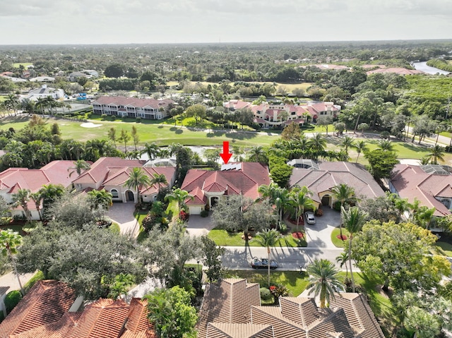 bird's eye view with golf course view and a residential view