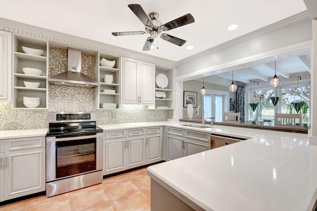 kitchen featuring hanging light fixtures, sink, wall chimney exhaust hood, appliances with stainless steel finishes, and beam ceiling