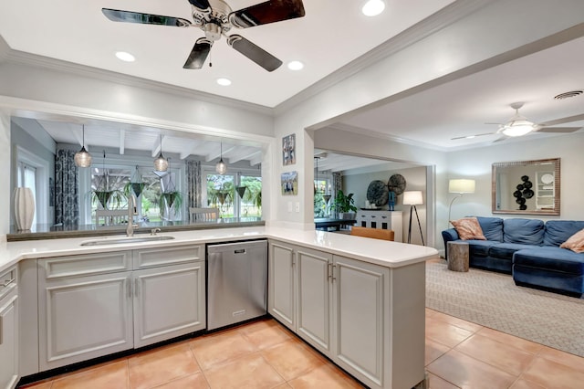 kitchen featuring dishwasher, sink, kitchen peninsula, crown molding, and light tile patterned floors