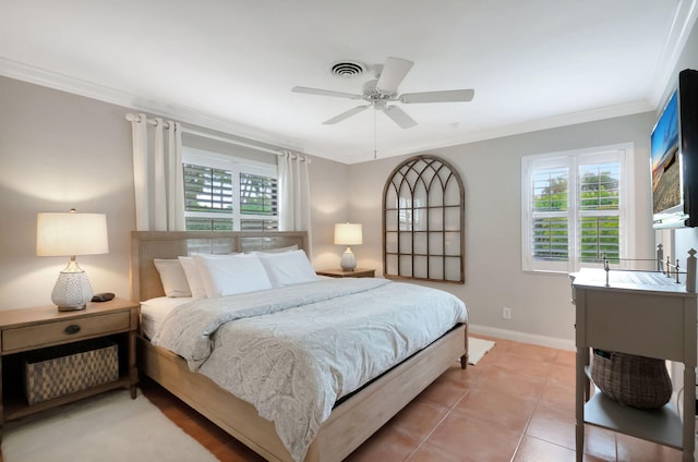 tiled bedroom with multiple windows, ceiling fan, and ornamental molding